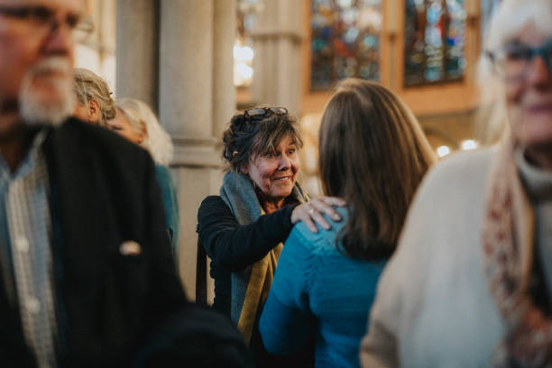 2 women in a church connecting